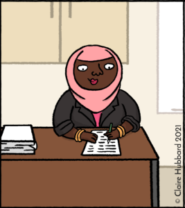 Cartoon of a teacher marking papers at a desk.